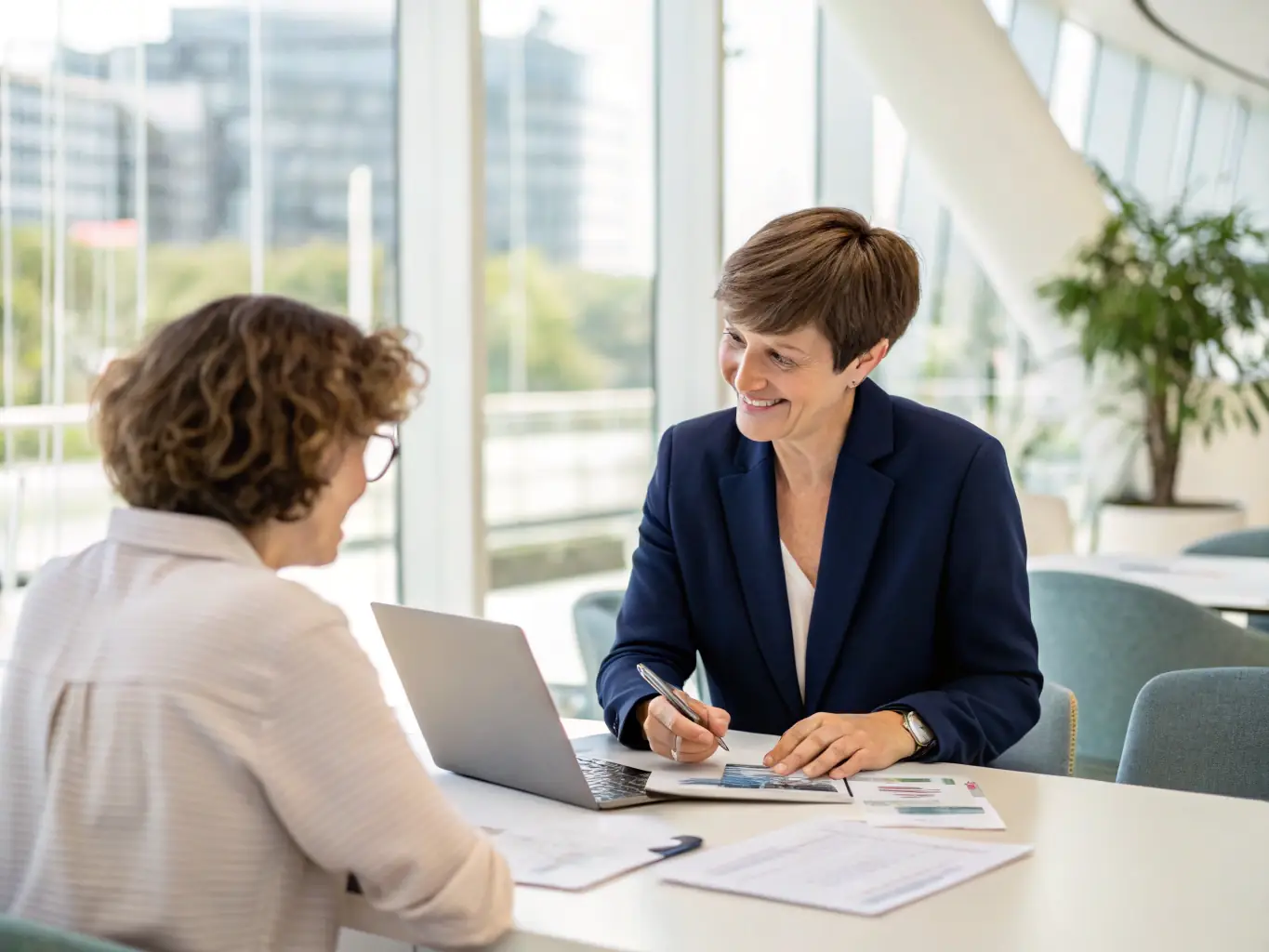 An image of a financial advisor providing personalized advice to a client in a modern office.